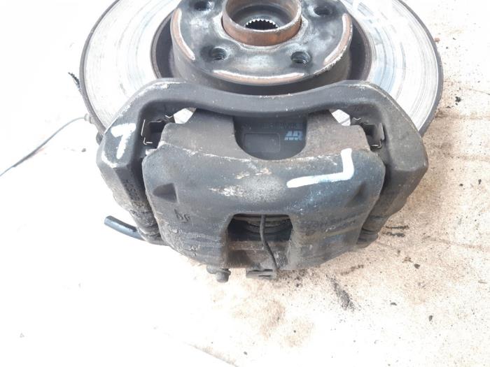 Front brake calliperholder, left from a Opel Combo 1.3 CDTI 16V ecoFlex 2012