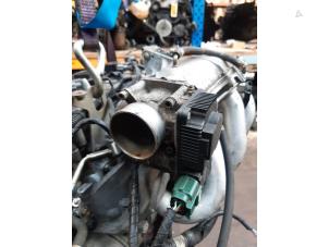 Used Throttle body Nissan Primera (P12) 1.8 16V Price € 40,00 Margin scheme offered by Boekholt autodemontage B.V