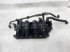 Intake manifold from a Volkswagen Polo IV (9N1/2/3) 1.4 16V 2002