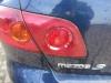 Luz trasera izquierda de un Mazda 3 Sport (BK14), 2003 / 2009 1.6 CiTD 16V, Hatchback, Diesel, 1.560cc, 81kW (110pk), FWD, Y601; Y603, 2004-06 / 2009-06, BK146; BK14Y 2005