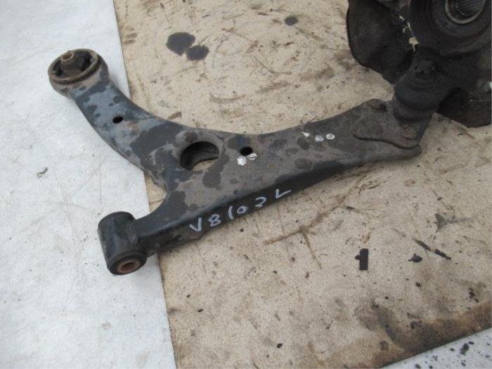 Front wishbone, left from a Toyota Corolla (E12) 2.0 D-4D 16V 110 2003