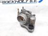 Throttle body from a Opel Astra G (F07) 1.8 16V 2002
