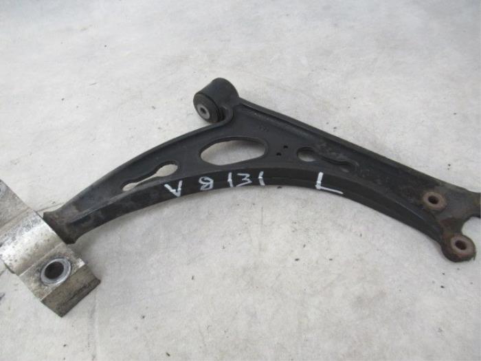 Front wishbone, left from a Volkswagen Touran (1T1/T2) 2.0 TDI 16V 140 2006