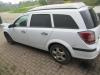 Rear door 4-door, left from a Opel Astra H SW (L35) 1.9 CDTi 16V 150 2006