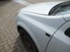 Front wing, left from a Opel Astra H SW (L35) 1.9 CDTi 16V 150 2006