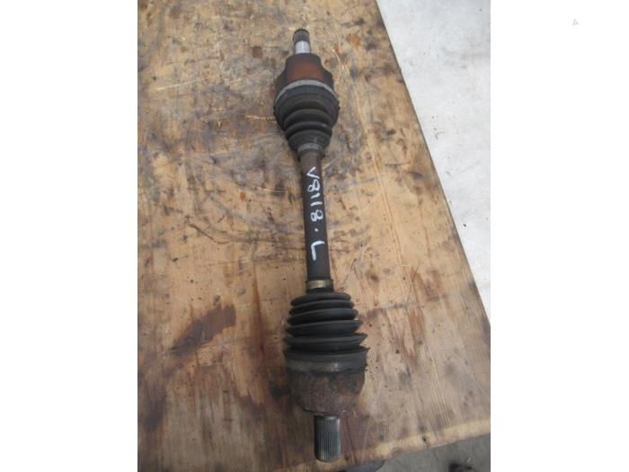 Front drive shaft, left from a Ford Mondeo IV 2.0 TDCi 140 16V 2010