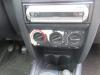 Radio CD player from a Renault Clio II (BB/CB), 1998 / 2016 1.2, Hatchback, Petrol, 1.149cc, 43kW (58pk), FWD, D7F726, 2004-01 / 2007-10, BB01F; CB01F; BB01K; CB01K; BB02D; CB02D 2005