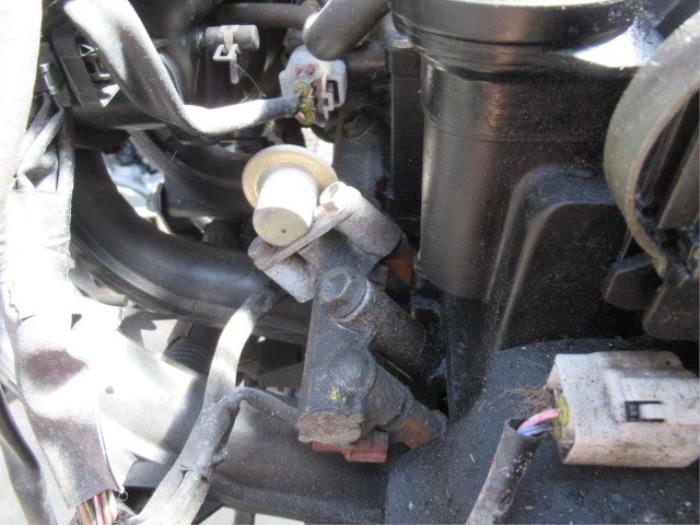 Fuel injector nozzle from a Daihatsu Cuore (L251/271/276) 1.0 12V DVVT 2004