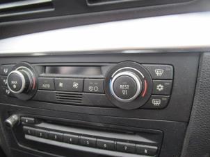 Usados Panel de control de calefacción BMW 1 serie (E87/87N) 118i 16V Precio € 35,00 Norma de margen ofrecido por Boekholt autodemontage B.V