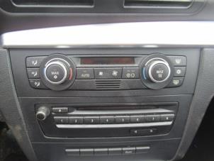 Used Radio control panel BMW 1 serie (E87/87N) 118i 16V Price € 50,00 Margin scheme offered by Boekholt autodemontage B.V