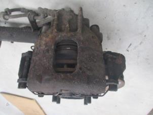 Used Rear brake calliper, right Ford Focus 1 Wagon 1.4 16V Price € 30,00 Margin scheme offered by Boekholt autodemontage B.V