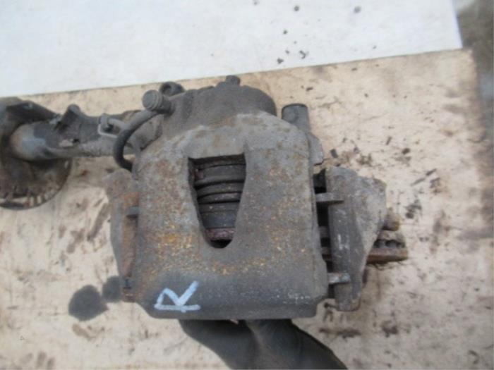 Front brake calliper, left from a Seat Ibiza III (6L1) 1.4 16V 75 2003