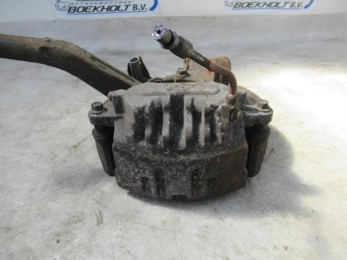Front brake calliper, left from a Cadillac CTS I 3.6 V6 24V 2006