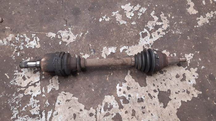 Front drive shaft, left from a Ford Mondeo III Wagon 1.8 16V 2003