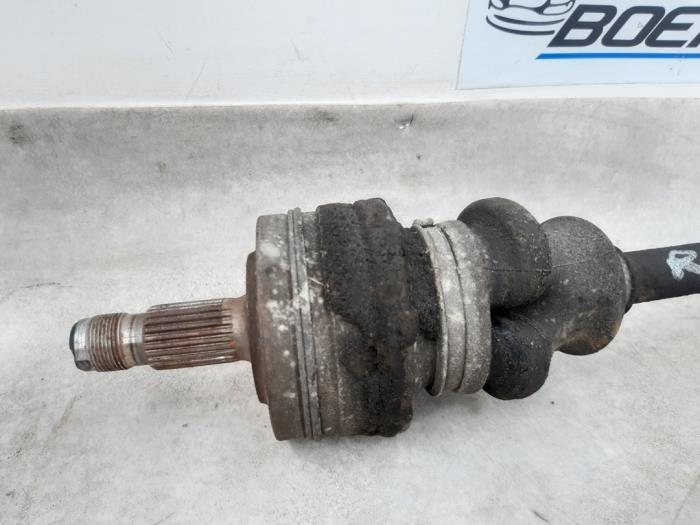 Drive shaft, rear right from a Mercedes-Benz C (W202) 1.8 C-180 16V 1997