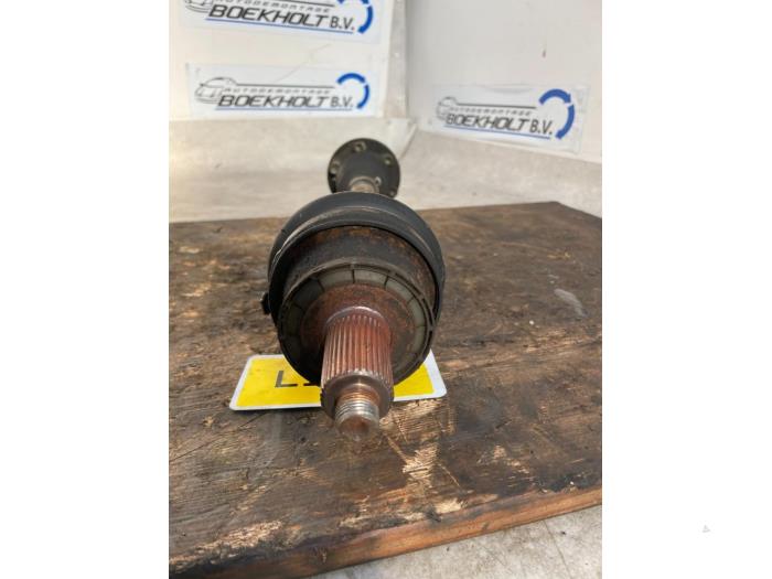 Front drive shaft, left from a Seat Ibiza III (6L1) 1.4 16V 85 2007