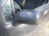 Wing mirror, left from a Opel Agila (A) 1.2 16V 2004