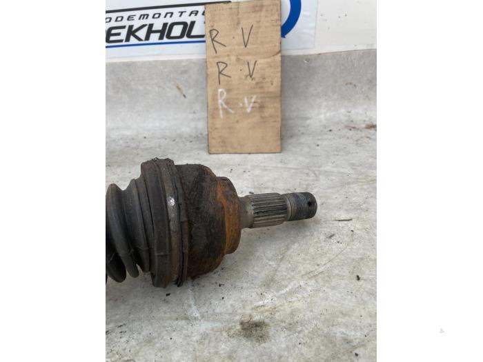 Front drive shaft, right from a Peugeot Partner Combispace 1.4 2002