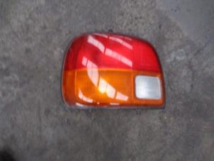 Used Taillight, left Daihatsu Cuore (L251/271/276) 850,Domino Price € 30,00 Margin scheme offered by Boekholt autodemontage B.V