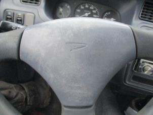 Used Left airbag (steering wheel) Daihatsu Cuore (L251/271/276) 850,Domino Price € 35,00 Margin scheme offered by Boekholt autodemontage B.V