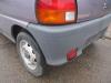 Zderzak tylny z Daihatsu Cuore (L251/271/276) 850,Domino 1998