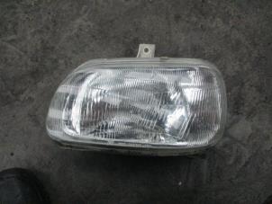 Used Headlight, left Daihatsu Cuore (L251/271/276) 850,Domino Price € 35,00 Margin scheme offered by Boekholt autodemontage B.V
