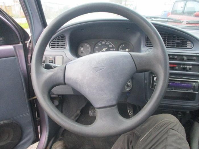 Steering wheel from a Daihatsu Cuore (L251/271/276) 850,Domino 1998