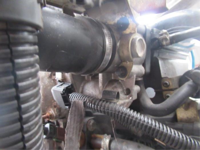 Throttle body from a Fiat Punto II (188) 1.4 16V 2005