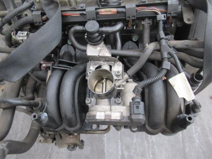 Throttle body from a Volkswagen Polo III (6N2) 1.0 2001