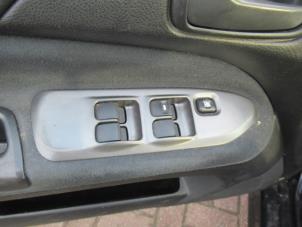 Usados Interruptor de ventanilla eléctrica Mitsubishi Lancer Wagon (CS) 1.6 16V Precio € 45,00 Norma de margen ofrecido por Boekholt autodemontage B.V
