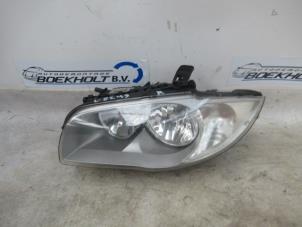 Used Headlight, left BMW 1 serie (E87/87N) 118i 16V Price € 95,00 Margin scheme offered by Boekholt autodemontage B.V