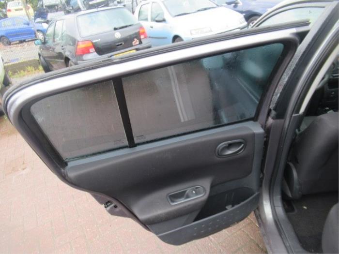 Rear door trim 4-door, left from a Renault Megane II (BM/CM) 1.5 dCi 80 2004
