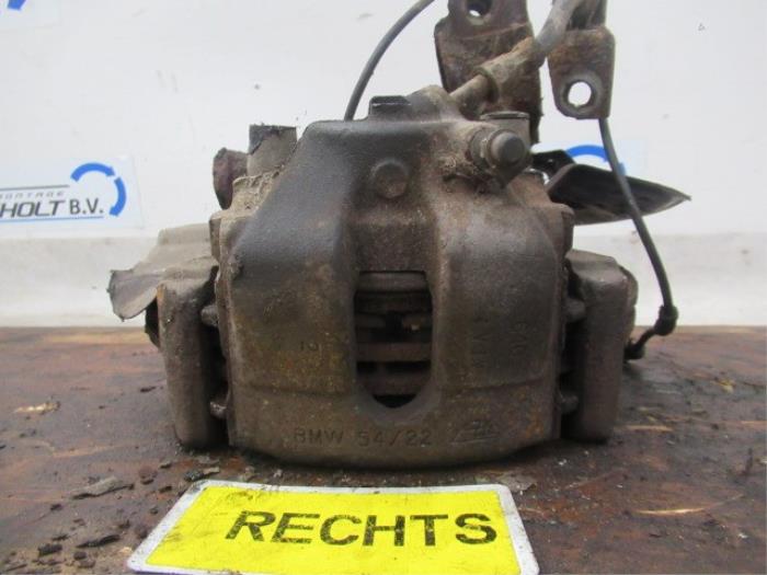 Front brake calliperholder, right from a BMW 3 serie (E46/4) 316i 2000