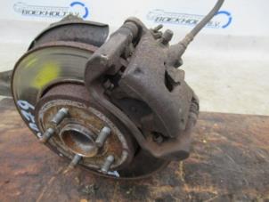 Used Rear brake calliper, left Ford Mondeo III Wagon 1.8 16V SCI Price € 39,00 Margin scheme offered by Boekholt autodemontage B.V