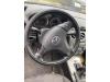 Left airbag (steering wheel) from a Mazda 6 (GG12/82), 2002 / 2008 1.8i 16V, Saloon, 4-dr, Petrol, 1.798cc, 88kW (120pk), FWD, L813; L829, 2002-08 / 2007-08, GG12 2003