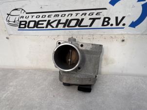 Usados Cuerpo de válvula de mariposa Fiat Stilo (192A/B) 1.6 16V Precio € 49,00 Norma de margen ofrecido por Boekholt autodemontage B.V