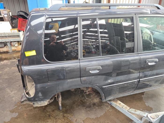 Usados Ventanilla triangular derecha detrás Mitsubishi Pajero Pinin (H6/H7) 2.0 GDI 16V 5-drs. Precio € 35,00 Norma de margen ofrecido por Boekholt autodemontage B.V