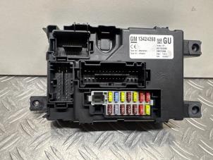 Ignition lock + computer from a Opel Corsa D 1.3 CDTi 16V ecoFLEX 2013
