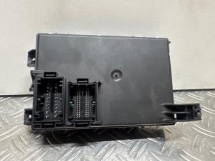 Ignition lock + computer from a Opel Corsa D 1.3 CDTi 16V ecoFLEX 2013