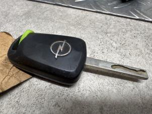 Ignition lock + computer from a Opel Corsa D 1.3 CDTi 16V ecoFLEX 2013