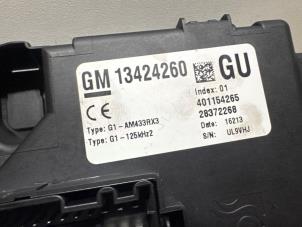 Ignition lock + computer from a Opel Corsa D 1.3 CDTi 16V ecoFLEX 2013