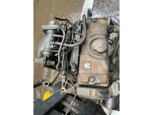 Engine from a Peugeot 206 (2A/C/H/J/S) 1.6 XS,XT 1999
