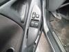 Commutateur vitre électrique d'un Toyota Yaris (P1), 1999 / 2005 1.0 16V VVT-i, Berline avec hayon arrière, Essence, 998cc, 50kW (68pk), FWD, 1SZFE, 1999-04 / 2005-09, SCP10 2000