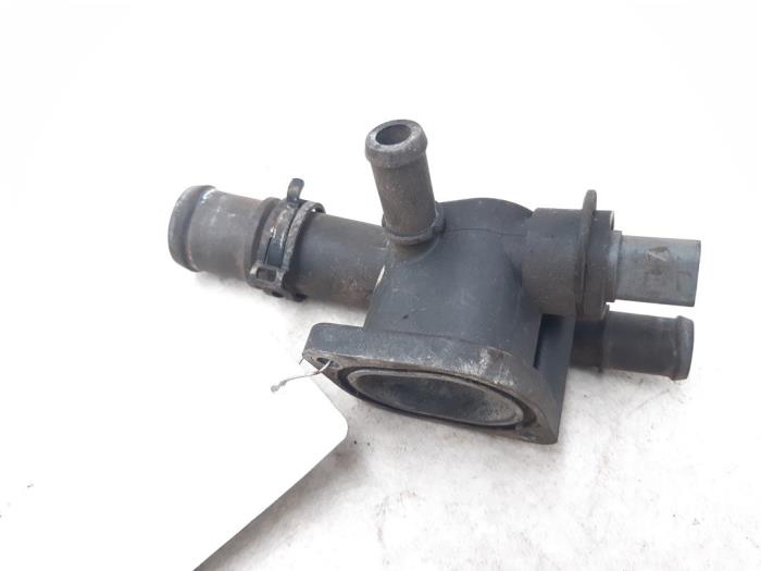 Thermostat housing from a Volkswagen Caddy III (2KA,2KH,2CA,2CH) 2.0 SDI 2008