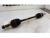 Front drive shaft, left from a Renault Clio III (BR/CR) 1.2 16V 75 2009