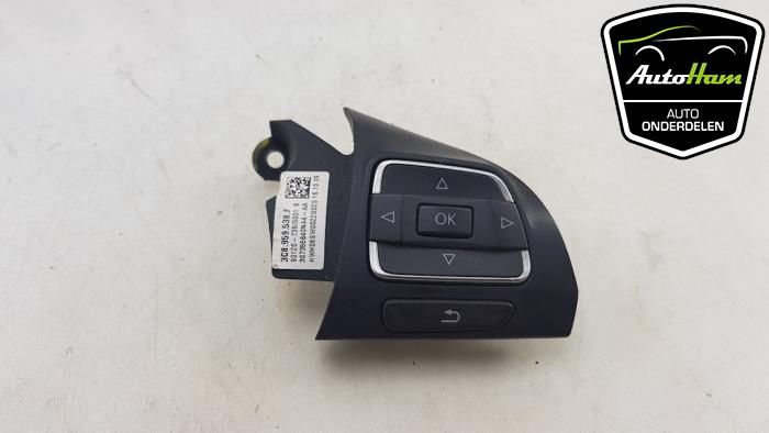 Interruptor de mando de volante de un Volkswagen Passat (3C2) 2.0 TDI 16V 140 2009