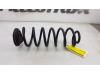 Rear coil spring from a Volkswagen Eos (1F7/F8) 1.4 TSI 16V BlueMotion 2011