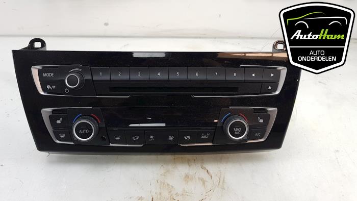 Heater control panel from a BMW 1 serie (F20) 118d 2.0 16V 2016