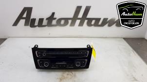 Używane Panel sterowania nagrzewnicy BMW 1 serie (F20) 118d 2.0 16V Cena € 100,00 Procedura marży oferowane przez AutoHam