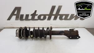 Used Fronts shock absorber, left Daihatsu Cuore (L251/271/276) 1.0 12V DVVT Price € 25,00 Margin scheme offered by AutoHam